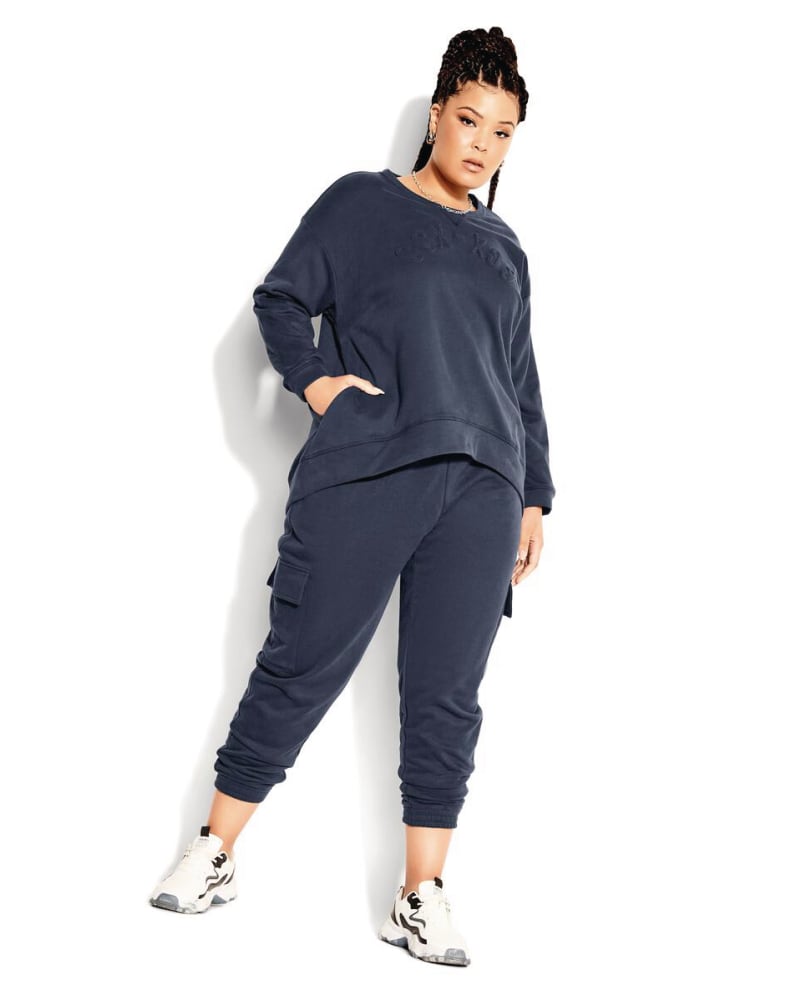 Plus size model wearing CCX Sweatshirt by CCX | Dia&Co | dia_product_style_image_id:172041